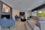 Living Room Features 70 Inch TV, Sonos Soundbar, Apple TV & Gas Fireplace